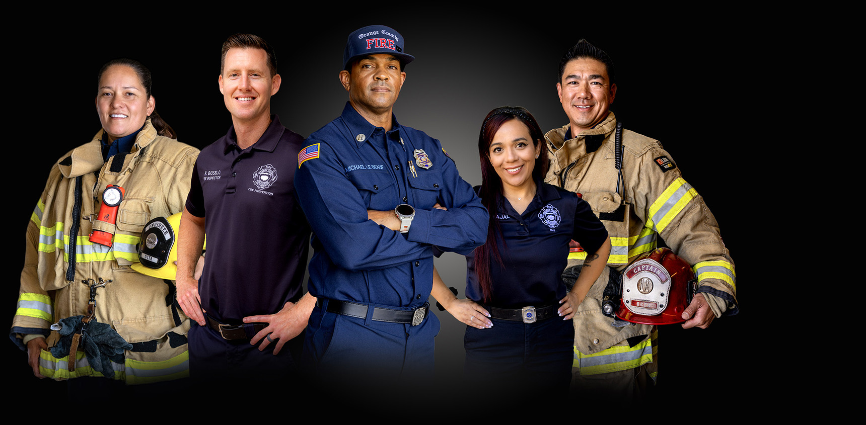 5 employees of OCFA from various departments smiling and posing